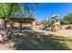 Community playground featuring a shaded picnic area, and slide, providing a fun and safe play area at 7939 E Stonecliff Cir, Mesa, AZ 85207