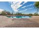 Community pool and sundeck offer a refreshing retreat with views of the surrounding landscape at 7939 E Stonecliff Cir, Mesa, AZ 85207