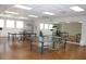 Bright and spacious game room featuring multiple ping pong tables, offering residents a fun recreational area at 8426 W Utopia Rd, Peoria, AZ 85382