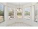 Bright kitchen nook featuring large windows providing natural light and views at 8426 W Utopia Rd, Peoria, AZ 85382