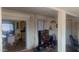 Bright space with access to multiple rooms, exercise equipment, and stylish furnishings throughout the open floor plan at 962 S Main Dr, Apache Junction, AZ 85120
