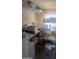 Ample storage room with shelves, drawers, and a variety of containers for organized and efficient storage at 962 S Main Dr, Apache Junction, AZ 85120
