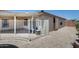 Gated backyard area includes pavers and an area for seating and enjoying the outdoors at 10557 W Louise Dr, Peoria, AZ 85383