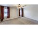 Spacious bedroom featuring two windows and neutral walls for a modern feel at 10557 W Louise Dr, Peoria, AZ 85383