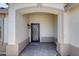 Covered front porch featuring decorative security door and tile flooring at 10557 W Louise Dr, Peoria, AZ 85383