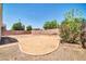 A backyard featuring gravel and a block fence at 11154 W Ashley Chantil Dr, Surprise, AZ 85378