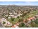 Wide aerial shot capturing a golf course, landscaping, and surrounding homes at 11633 N 40Th Way, Phoenix, AZ 85028