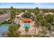 This aerial showcases the pool, shaded patio, lush landscaping, and community amenities at 11633 N 40Th Way, Phoenix, AZ 85028