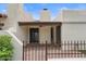 Back patio has pavers, an iron fence and a covered area for outdoor enjoyment at 11633 N 40Th Way, Phoenix, AZ 85028