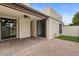Private back patio with brick pavers and a cozy outdoor space at 11633 N 40Th Way, Phoenix, AZ 85028