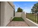 Back patio features brick pavers and artificial turf for low maintenance living at 11633 N 40Th Way, Phoenix, AZ 85028