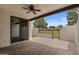 Back patio features brick pavers and views of the lush green community at 11633 N 40Th Way, Phoenix, AZ 85028