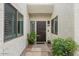 Front exterior showing the door with plants and desert landscaping at 11633 N 40Th Way, Phoenix, AZ 85028