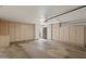 Large garage features built-in storage cabinets along the walls for organization at 11633 N 40Th Way, Phoenix, AZ 85028