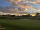 Lush golf course view with vibrant sunset skies in a serene outdoor setting, perfect for recreation and relaxation at 11633 N 40Th Way, Phoenix, AZ 85028
