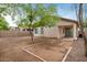 Spacious backyard with a low maintenance landscape perfect for outdoor activities and relaxation at 11702 W Lincoln St, Avondale, AZ 85323