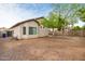 Expansive backyard featuring plenty of open space and mature trees, ideal for outdoor enjoyment at 11702 W Lincoln St, Avondale, AZ 85323