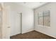 Clean bedroom features a closet, window, and neutral carpet flooring to create a cozy atmosphere at 11702 W Lincoln St, Avondale, AZ 85323