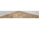 Close up on neutral tile with white baseboards at 11702 W Lincoln St, Avondale, AZ 85323