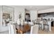 Open concept dining and kitchen area with stainless steel appliances at 11948 E Aster Ln, Florence, AZ 85132