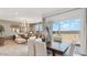 Dining area and living room with lots of light and stylish décor at 11948 E Aster Ln, Florence, AZ 85132
