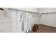 Spacious walk-in closet with ample storage space, hanging rods, and shelves at 11948 E Aster Ln, Florence, AZ 85132
