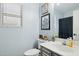 Bathroom with a window providing natural light and decor details around the sink, creating a relaxing vibe at 13320 N 82Nd Dr, Peoria, AZ 85381