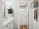 Bathroom featuring a shower and vanity with storage, providing a clean and functional space at 13320 N 82Nd Dr, Peoria, AZ 85381