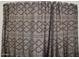 Close-up of a textured shower curtain, adding a touch of pattern and style to the bathroom at 13320 N 82Nd Dr, Peoria, AZ 85381
