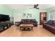 Comfortable living room with a ceiling fan, and plenty of natural light at 1409 S Revere --, Mesa, AZ 85210