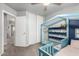 bedroom with bed, closet, and bright windows at 15427 W Port Au Prince Ln, Surprise, AZ 85379