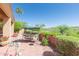 Backyard patio with seating and landscaping offers a serene outdoor retreat at 17342 E Quail Ridge Dr, Fountain Hills, AZ 85268