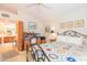 Cozy bedroom featuring a comfortable bed, workspace, and access to the bathroom at 17342 E Quail Ridge Dr, Fountain Hills, AZ 85268