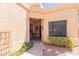 Charming home entrance with covered porch and well-maintained landscaping at 17342 E Quail Ridge Dr, Fountain Hills, AZ 85268