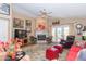 Comfortable living room with a fireplace, TV and outdoor access creating a cozy and inviting space at 17342 E Quail Ridge Dr, Fountain Hills, AZ 85268