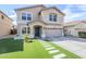 Charming two-story home features manicured lawn, walkway, and two-car garage at 1839 E Parkside Ln, Phoenix, AZ 85024