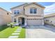 Charming two-story home features manicured lawn, walkway, and two-car garage at 1839 E Parkside Ln, Phoenix, AZ 85024