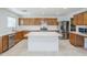 The kitchen has an island, stainless steel appliances, and ample cabinet space at 1839 E Parkside Ln, Phoenix, AZ 85024