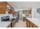 Modern kitchen boasts stainless steel appliances, sleek countertops, and ample cabinet space at 1839 E Parkside Ln, Phoenix, AZ 85024