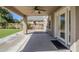 Covered patio perfect for entertaining, complete with a ceiling fan and exterior access at 1839 E Parkside Ln, Phoenix, AZ 85024