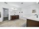 Serene bathroom with double vanity, soaking tub, and a large window for natural lighting at 18429 W Mauna Loa Ln, Surprise, AZ 85388