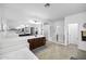 Bright bathroom featuring dual vanities, a soaking tub, and a separate glass-enclosed shower at 18429 W Mauna Loa Ln, Surprise, AZ 85388