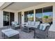 Outdoor patio area with modern seating and stylish decor at 18429 W Mauna Loa Ln, Surprise, AZ 85388