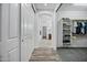 Well-organized walk-in closet with built-in shelving and ample storage space for clothes and accessories at 18429 W Mauna Loa Ln, Surprise, AZ 85388