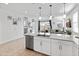 Bright, open kitchen with stainless steel appliances and a large island at 19407 W Pierson St, Litchfield Park, AZ 85340