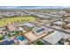 Expansive aerial view of a Primary-planned community featuring residential homes, green spaces, and community amenities at 19806 W Marshall Ave, Litchfield Park, AZ 85340