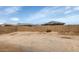 Backyard featuring a tall block wall providing privacy and ample space for customization and landscaping at 19806 W Marshall Ave, Litchfield Park, AZ 85340