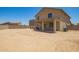 Spacious backyard showcasing a covered patio, offering a versatile outdoor living area at 21648 W Ashleigh Marie St, Buckeye, AZ 85326