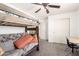 Bedroom featuring desk, bunk beds and closet at 21648 W Ashleigh Marie St, Buckeye, AZ 85326