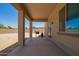 Covered patio with grill and fenced yard at 21648 W Ashleigh Marie St, Buckeye, AZ 85326